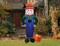 7' Air Blown Inflatable Thanksgiving Scarecrow Standing Next To Pumpkin GTF00048-7